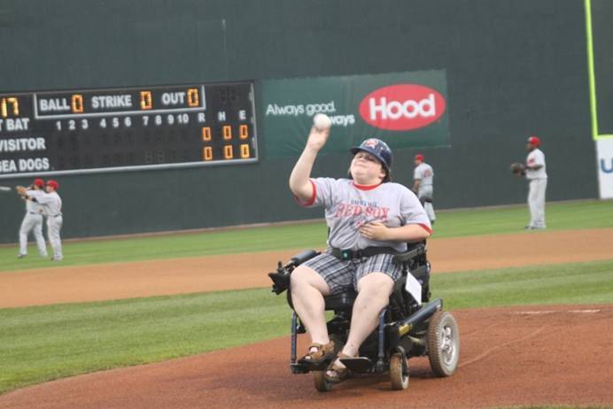 Zach Quinn, 12, Albion MDA Goodwill Ambassador, threw out the first pitch at the C.N.Brown sponsored Jerseys Off Their Backs event.
