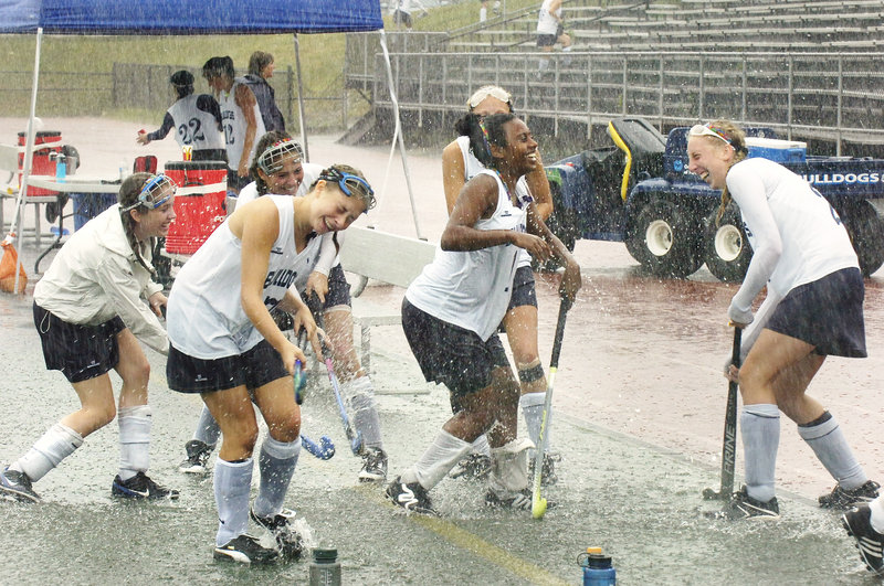 Seventeen teams were to play in the field hockey Play Day Wednesday at Fitzpatrick Stadium. So wouldn't you know, in a summer of glorious weather, Mother Nature picked Wednesday to get even. Didn't bother the Portland girls, though. Just have fun. And they did.