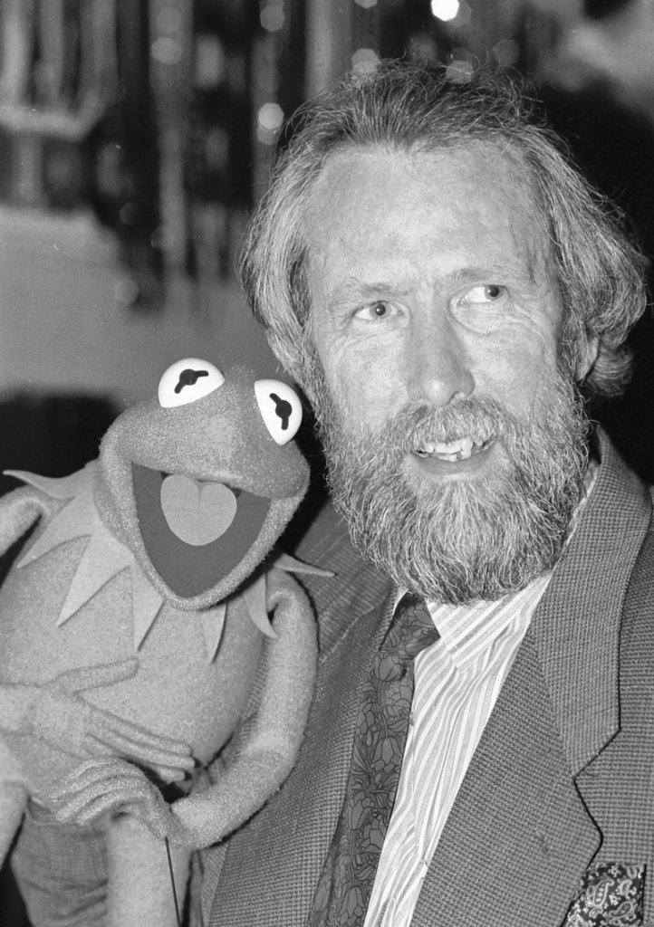 Jim Henson, creator of the Muppets, poses with Kermit the Frog in this 1988 photo. The first Kermit was more lizard-like and a duller green.