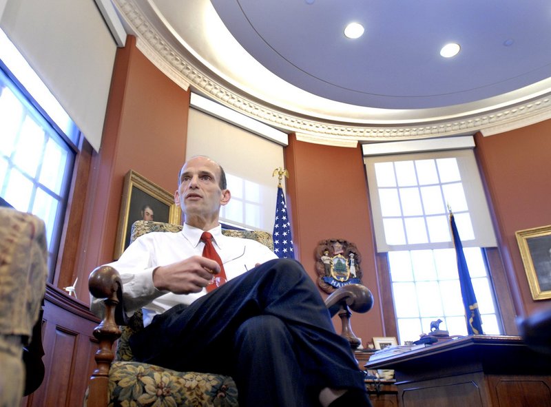 Gov. John Baldacci sits in his office in the State House, a chair that others are competing to fill next January.