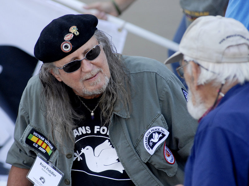 Rod Fiddler of Ruidoso, N.M., speaks with fellow veterans prior to the Veterans for Peace march and rally in Portland on Sunday.