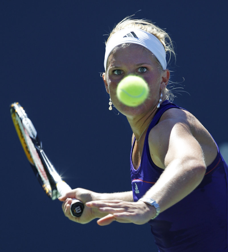 Melanie Oudin keeps her eyes on the ball during a first-round match against Olga Savchuk on Monday. Oudin won 6-3, 6-0 to advance to the second round.