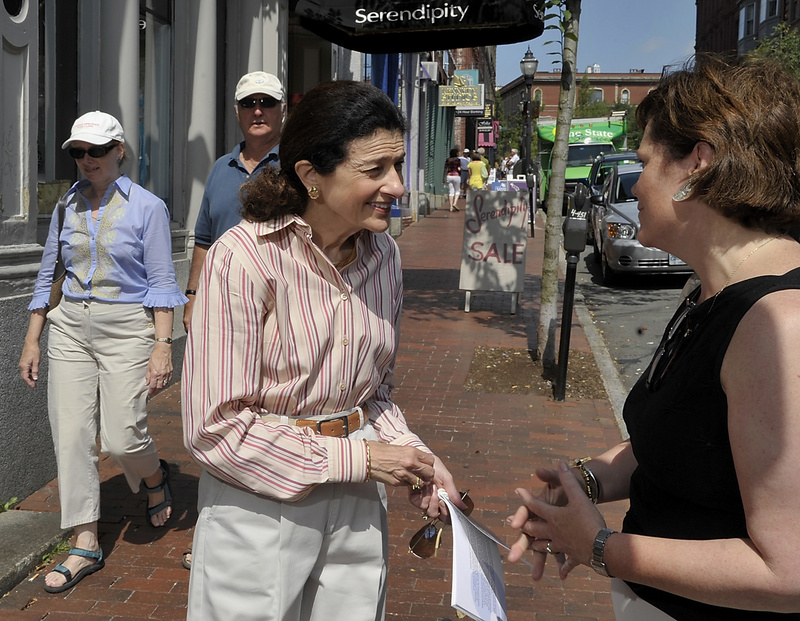 Maine's senior senator, Olympia Snowe, on a break from Senate proceedings, interacts with constituents in Portland's Old Port early last month.
