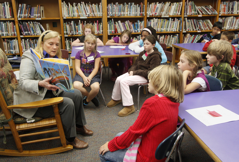 U.S. Rep. Chellie Pingree, D-Maine, reads from “The Circus Ship” to Anne Dalphin’s fourth-graders at the Presumpscot School in Portland on Monday. Pingree, co-sponsor of a resolution making this week National Adult Education and Family Literacy Week, said she wants to raise awareness about the need for greater adult literacy in Maine. According to the National Adult Literacy Survey, 42 percent of Maine adults read below the level needed to get a job that can support a family.