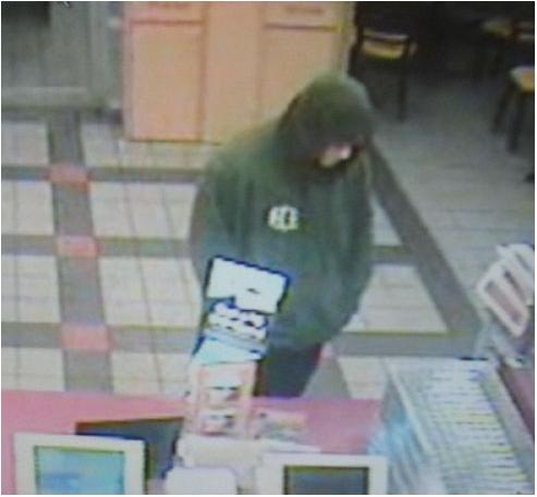 A robbery suspect appears in a segment of surveillance video at Dunkin' Donuts on Main Street in Westbrook.