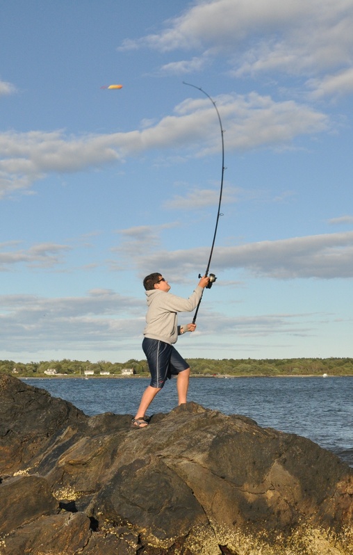 Surf-casting from quieter coastal spots in September is an ideal way to fish for migrating striped bass and bluefish.
