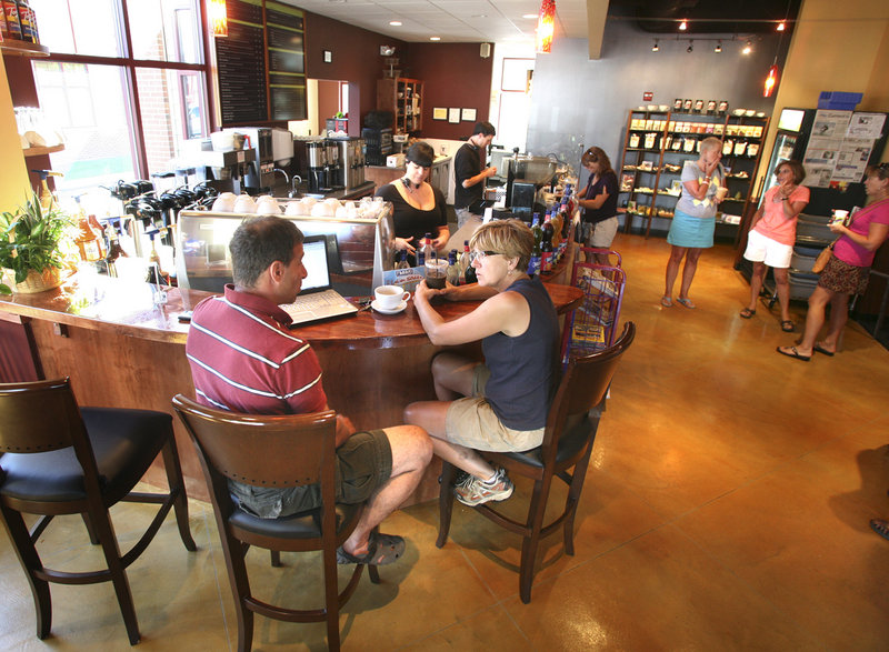 Patrons enjoy food and conversation at the Cambridge Coffee Bar & Bakehouse.