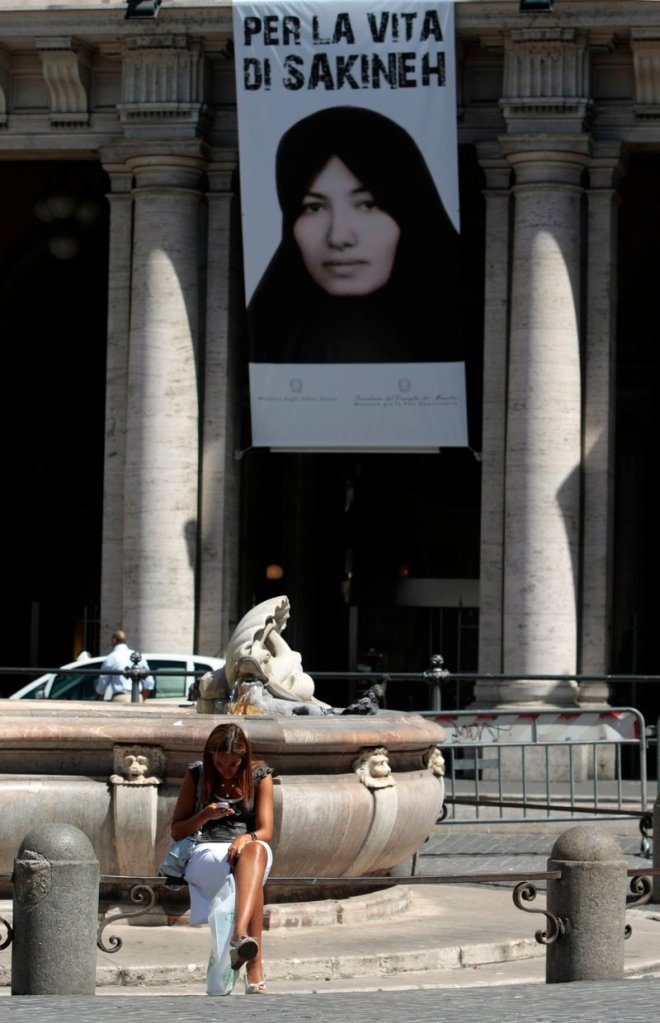 A poster of Sakineh Mohammadi Ashtiani, the Iranian woman facing a sentence of death by stoning, hangs in central Rome from Italy’s Equal Opportunities Ministry, which wants the sentence lifted. The writing reads in Italian: “For the life of Sakineh.”