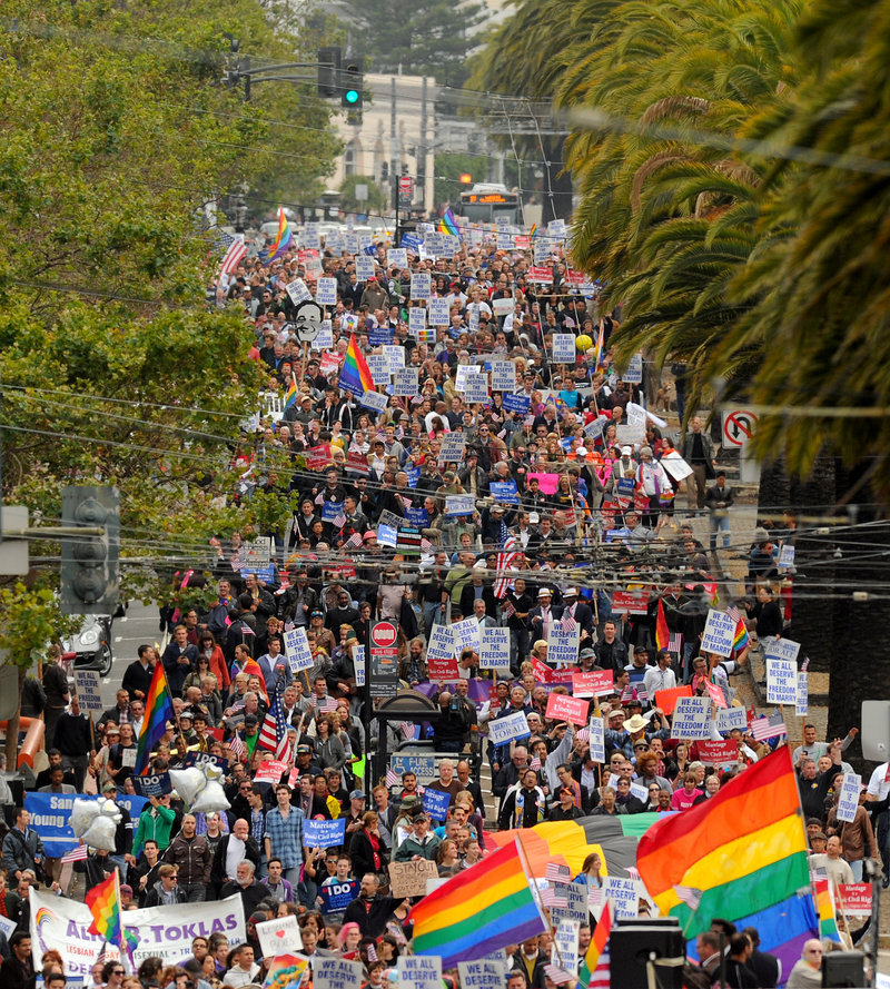 Same-sex marriage supporters march in San Francisco on Aug. 4 celebrating a federal judge's decision overturning California's Proposition 8.