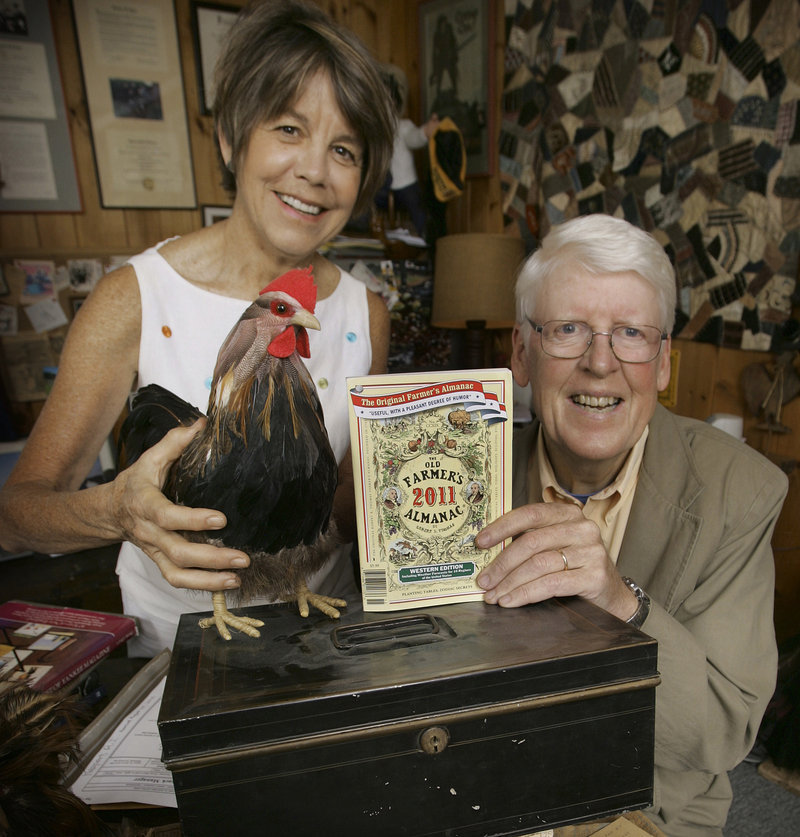 Editor Janice Stillman, left, and editor-in-chief Jud Hale pose in Dublin, N.H., with the 2011 edition of the Old Farmer’s Almanac. It has been published for 219 years.