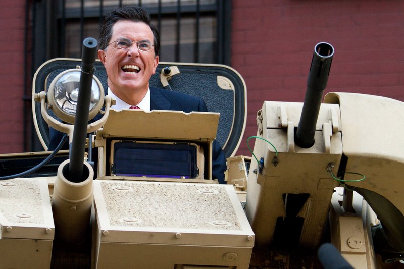Stephen Colbert rides an Army tank in New York on Wednesday.