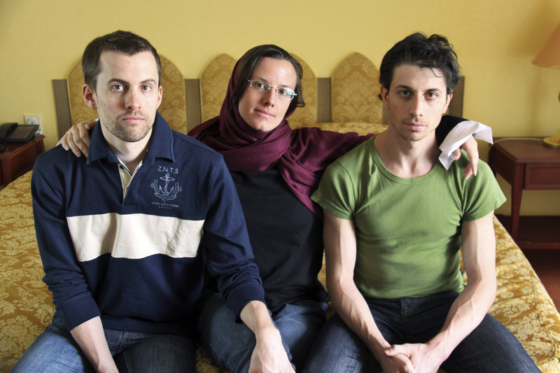 American hikers Shane Bauer, left, Sarah Shourd, center, and Joshua Fattal are shown at the Esteghlal Hotel in Tehran, Iran, on May 20. Shourd could be released Saturday.