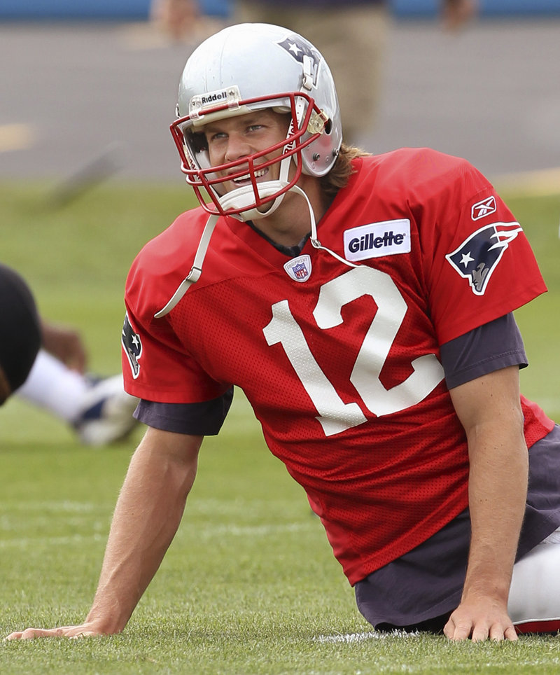 Patriots quarterback Tom Brady resumed his usual routine of stretching before practice Thursday after escaping injury in a two-car crash.