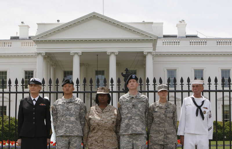 From left, Petty Officer Autumn Sandeen, Lt. Dan Choi, Cpl. Evelyn Thomas, Capt. Jim Pietrangelo II, Cadet Mara Boyd and Petty Officer Larry Whitt handcuffed themselves to the fence outside the White House during an April 16 protest for gay rights. Activists are pressing Congress to repeal the military’s “don’t ask, don’t tell” policy.