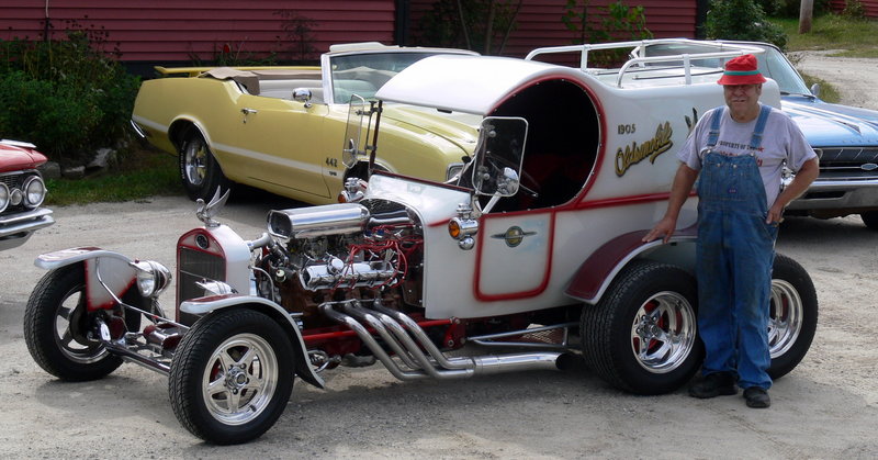 Skip Watkins built this street rod, a replica of a 1905 Oldsmobile "Pie Wagon," at his body shop in Casco. The custom creation is just one of some 25 vintage Oldsmobiles he owns.