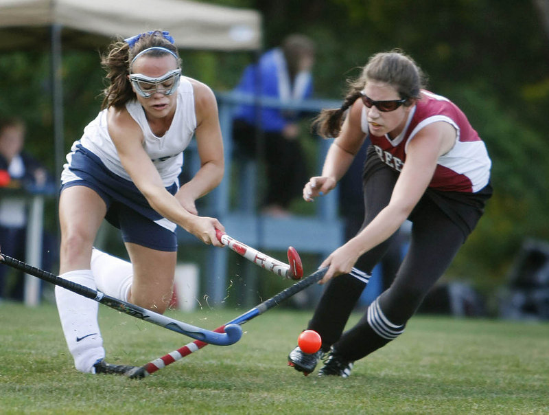 Shelby Spencer of York, left, and Julia Maine of Greely compete for a loose ball Monday during their Western Maine Conference field hockey game. York, the top-ranked team in Western Class B, controlled the tempo and took advantage of penalties on Greely to collect a 3-0 victory.