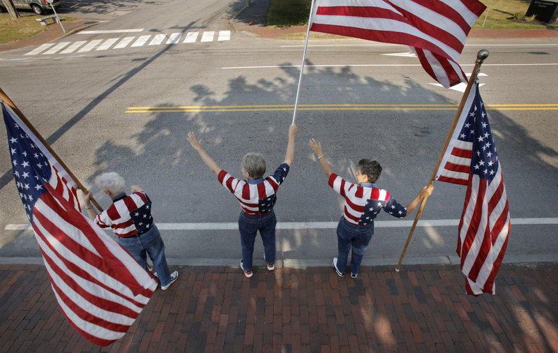 Freeport's Flag Ladies wave their banners on a recent Tuesday.