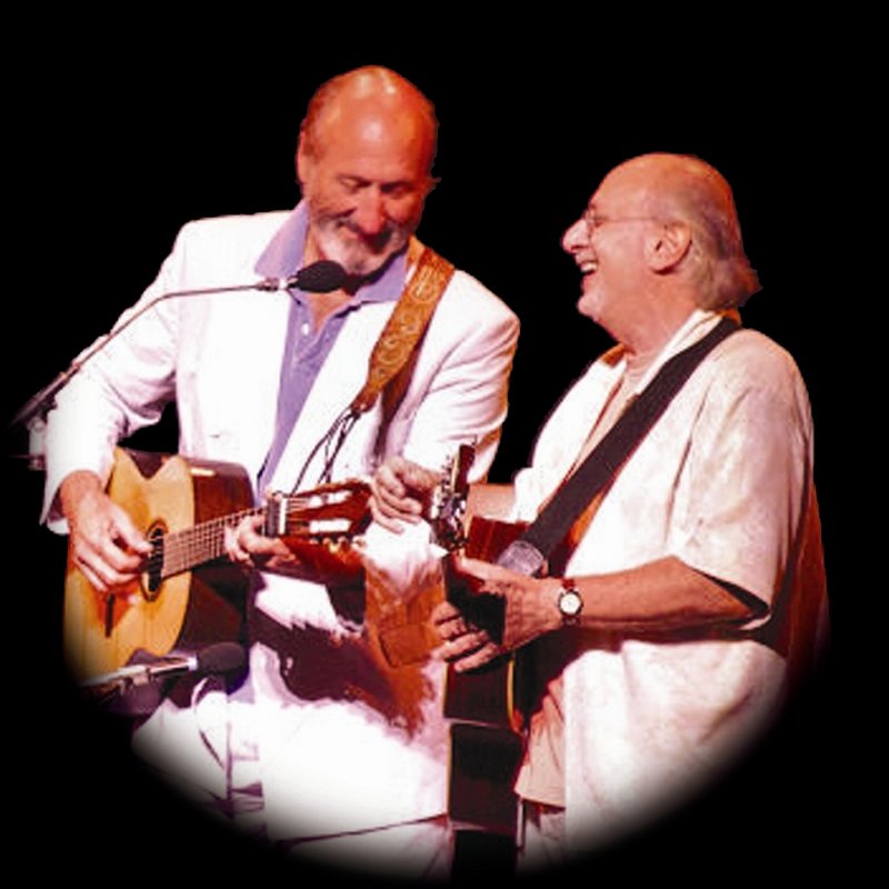 Noel Paul Stookey and Peter Yarrow perform at the University of Maine at Orono on Sunday.