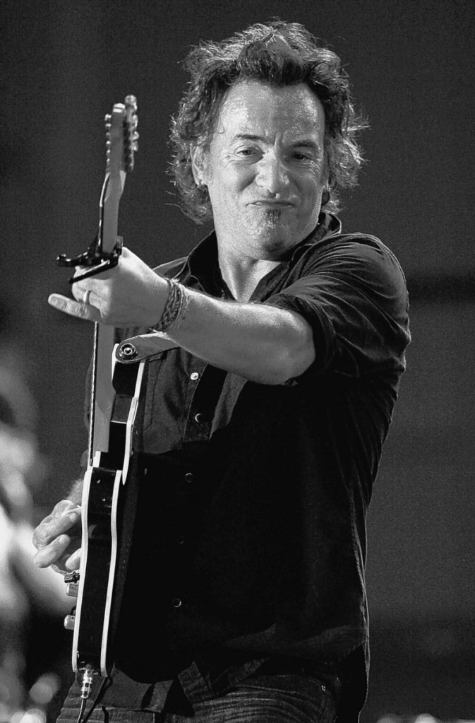Bruce Springsteen performs with the E Street Band in a benefit rehearsal in Asbury Park, N.J.