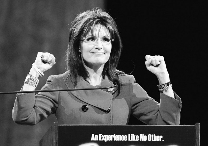 Former Republican vice presidential candidate Sarah Palin gestures as she addresses the National Quartet Convention in Louisville, Ky., Thursday,