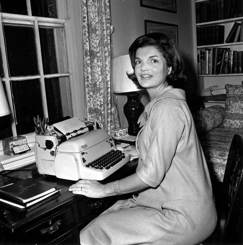 Jacqueline Kennedy poses at the typewriter where she wrote her weekly “Candidate’s Wife” column in this Oct. 5, 1960, photo. The column discussed policies along with personal stories and her advice on everyday matters such as child-rearing and shopping.