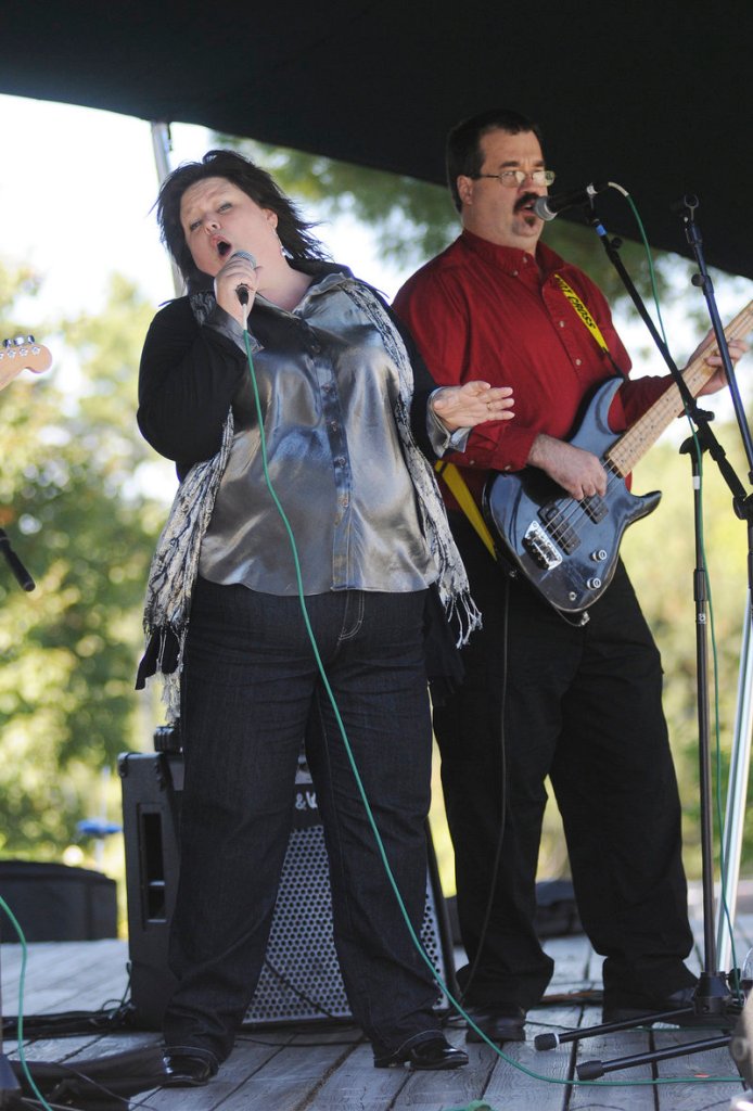 Mary Bergey leads the blues band Rattleboxx through a number at L.L. Bean's Discovery Park.