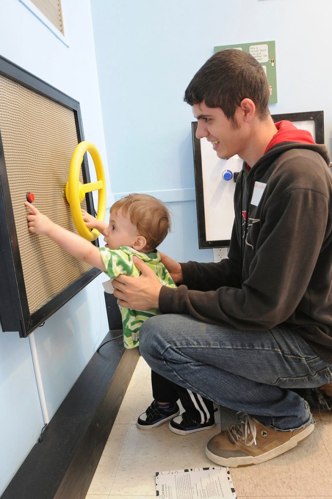 Hayden Inman, 14 months old, and his father, Alex LeBeau of Waterville, play at the Children’s Museum and Theatre of Maine in Portland at the NICU reunion.
