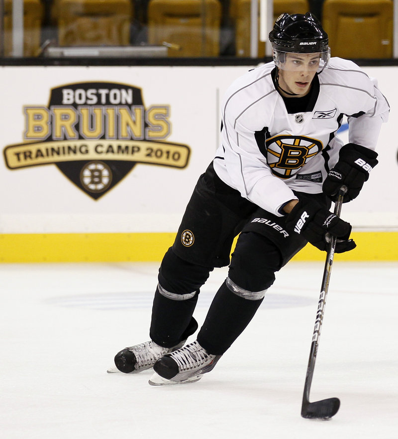 Tyler Seguin skates with the puck during a Boston Bruins practice in May.