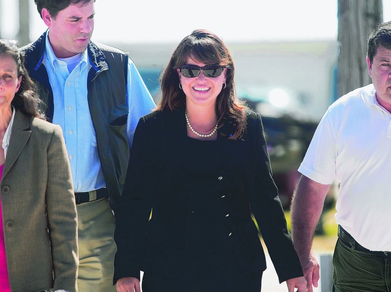 Delaware Senate candidate Christine O’Donnell arrives at a GOP picnic Sunday.