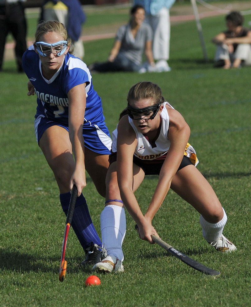 Cheyenne Knox, left, of Kennebunk and Thornton Academy’s Nichole Moore try to control the ball. Knox scored the only goal of the first half.