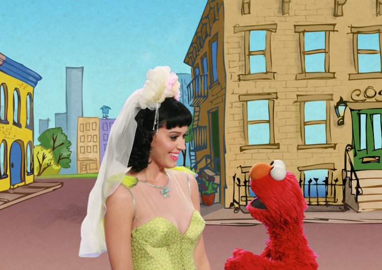 Singer Katy Perry performs with Elmo in a music video about opposites called “Hot N Cold” on “Sesame Street.”
