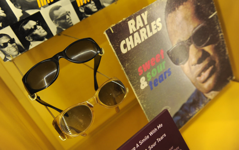 Ray Charles' signature sunglasses are on display at the library, which opened Thursday.