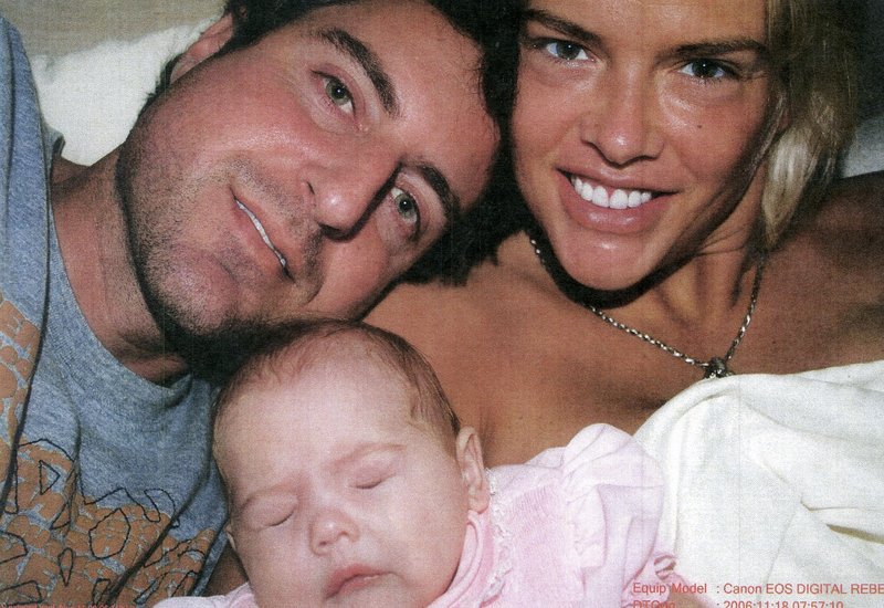 This photo of Anna Nicole Smith with daughter Dannielynn and Howard K. Stern was shown to jurors.