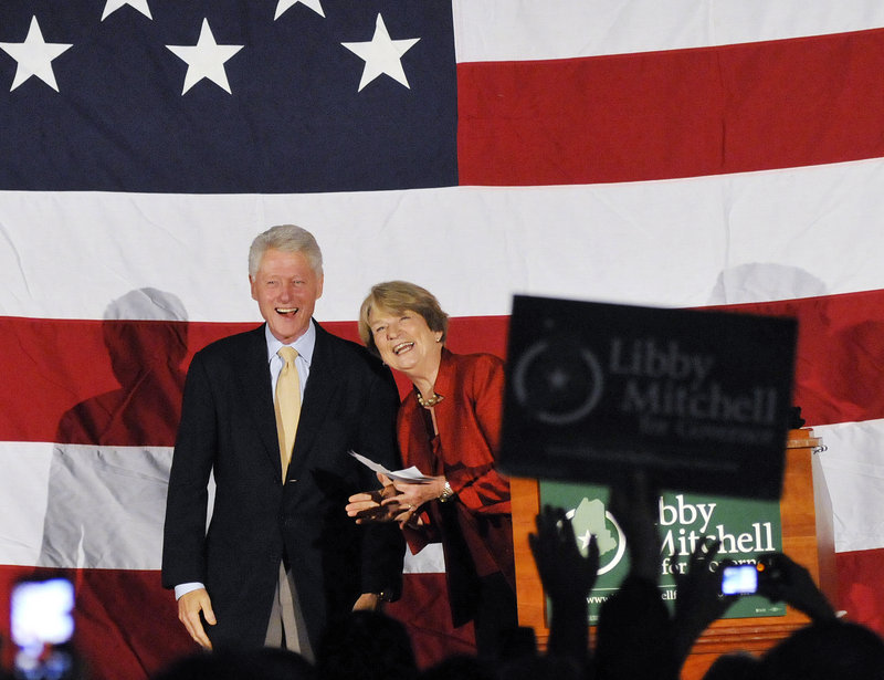 Former President Bill Clinton shares the stage with Democratic gubernatorial candidate Elizabeth “Libby” Mitchell at Southern Maine Community College in South Portland on Sunday evening.