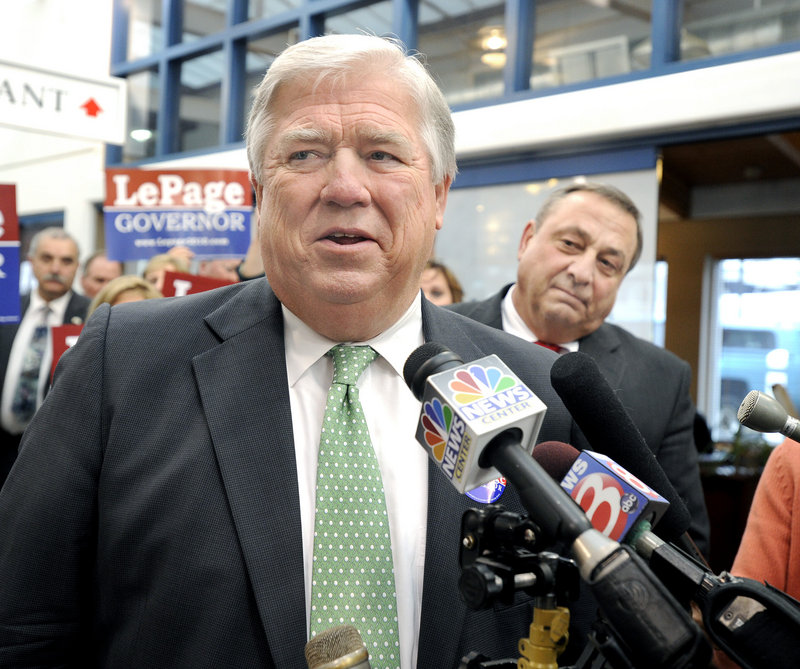 Mississippi Gov. Haley Barbour campaigns for Paul LePage, right, at DiMillo’s Restaurant in Portland on Monday.