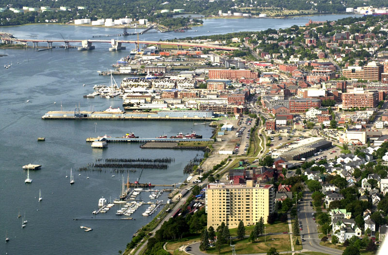 Aerial view of Portland waterfront with Portland House in foreground looking west to Casco Bay bridge.