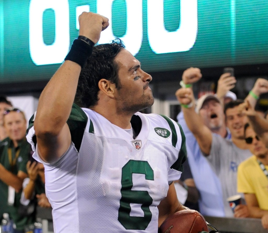 Mark Sanchez reacts to Jets fans as New York rallies past New England for its first win of the season.