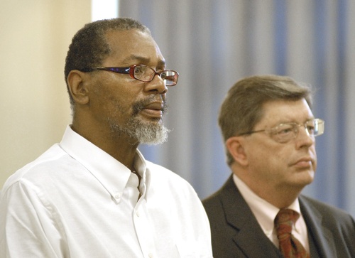Rory Holland, left, with his attorney, Clifford Strike