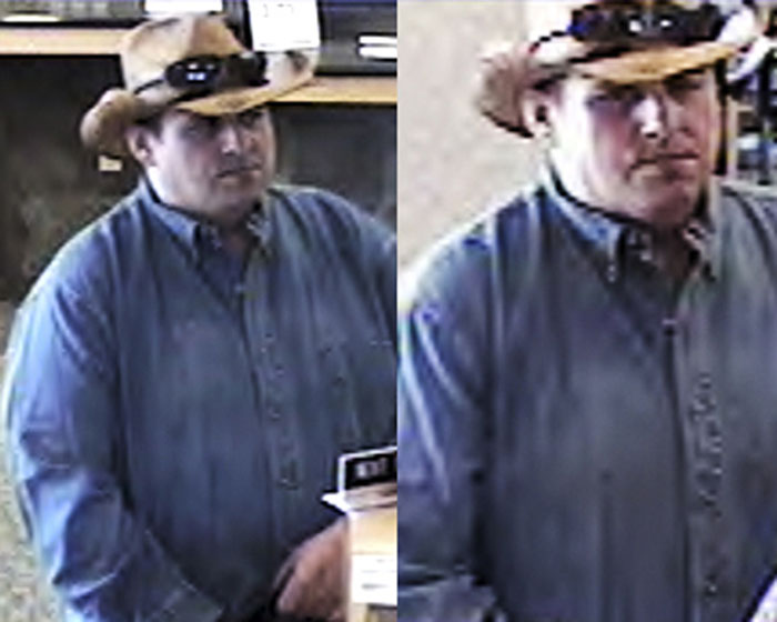 An undated file photo from security video released by the FBI, showing a man dubbed by the FBI as the "burly bandit," inside a bank in Warwick, R.I. Robert Ferguson, arrested in July 2010, has entered a guilty plea to committing 11 robberies.