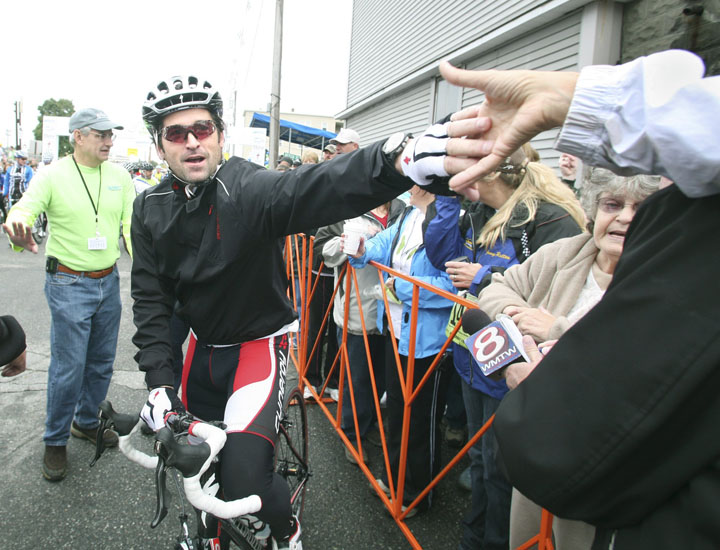 Maine native and actor Patrick Dempsey meets a fan before the start of last year's Dempsey Challenge in Lewiston.