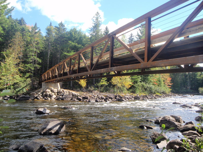 The new bridge over the Dead River connects to the trail leading to the Grand Falls Hut. The bridge and the hut will be dedicated on Saturday.