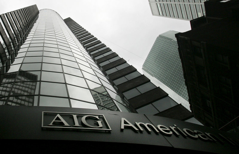 An AIG office building towers above the street in New York City. The New York Fed gave the insurer an $85 billion emergency loan in September 2008, and that bailout eventually grew to a taxpayer commitment of more than $180 billion.