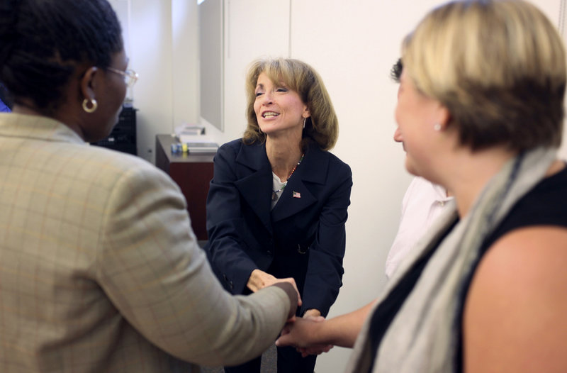 New York Republican House candidate Nan Hayworth shakes hands with members of the Westchester Putnam Association of Realtors in Westchester, N.Y., this week. “I do think we’re going to have a big Republican wave,” Hayworth says. “Very few people look at what’s going on now and say, ‘Yeah, I want more of that.’”