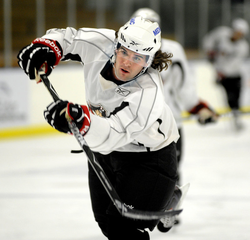 Dennis McCauley, who recently came to Portland from the Buffalo camp, takes a shot during practice Friday.