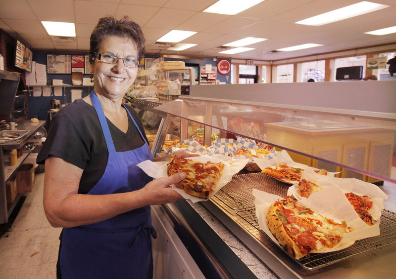 Bridget Colucci Jacobsay has worked at Colucci's in Portland for more than 20 years. The store, a longtime fixture on Munjoy Hill, has a wide array of lunch offerings and also sells prepared dinners to go.
