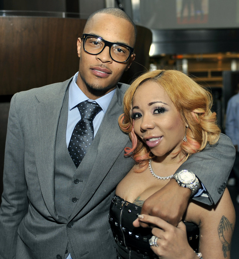Clifford “T.I.” Harris poses with his wife, Tameka “Tiny” Cottle, during an Alzheimers “For The Love Of Our Fathers” foundation honoree luncheon Sunday in Atlanta.
