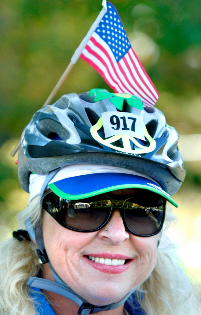 Norma Boulet of Greene wears an American flag on her helmet in honor of her father, who was a World War II veteran. Boulet was riding the 25-mile course.