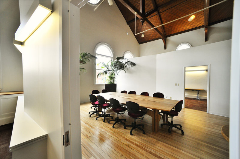 A conference space known as the Atrium takes advantage of the natural lighting provided by large windows on the third floor.