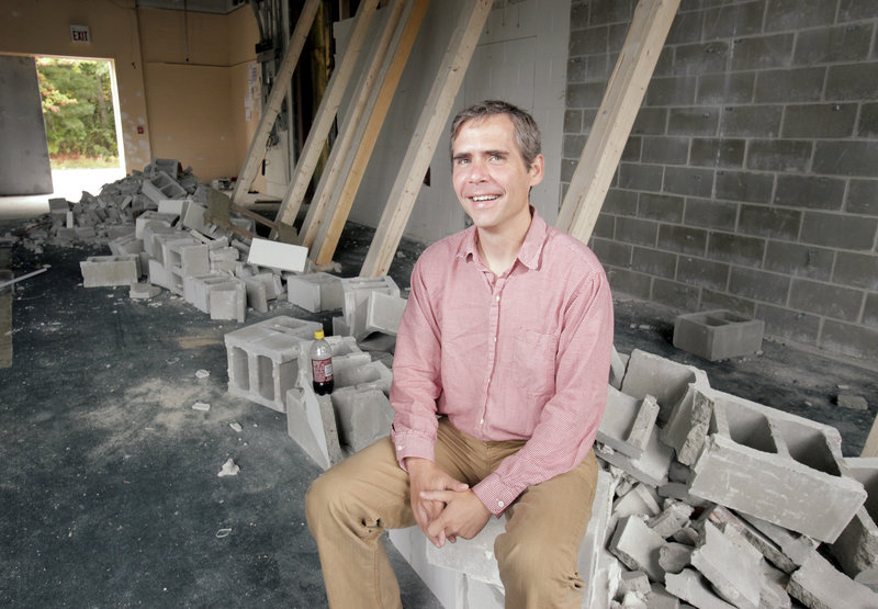Brett Wickard, owner of Bull Moose, is renovating space next to his Scarborough store to make room for 20,000 books.