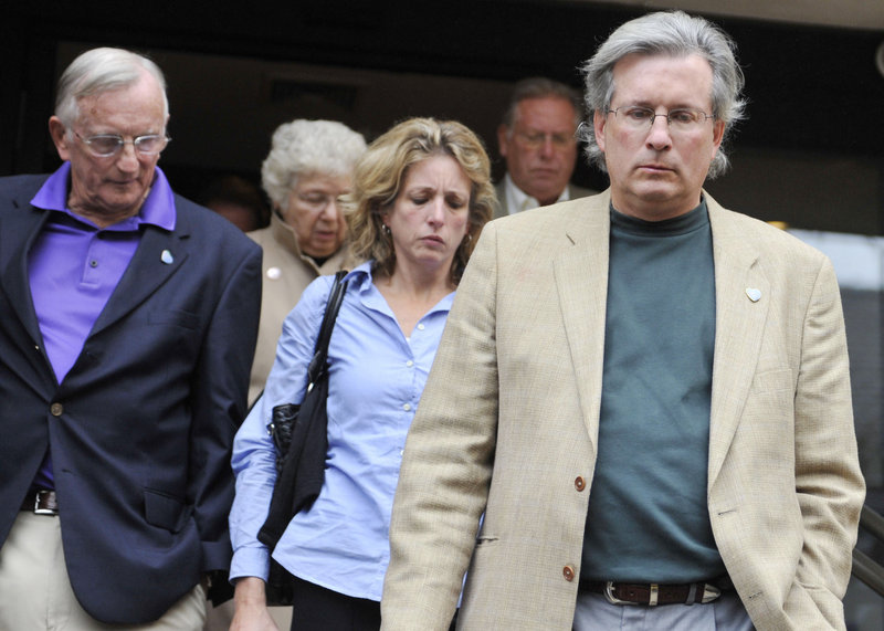 Dr. William Petit Jr., the sole survivor of a home invasion that left his wife and daughters dead, walks out of court in New Haven, Conn., on Tuesday. Paroled burglar Steven Hayes was convicted of 16 counts in the case.